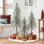 Ensemble d'arbres de Noël artificiels saupoudrés de neige avec bases recouvertes de toile de jute