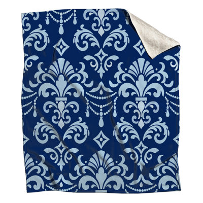 Couvertures bleues à motif damassé