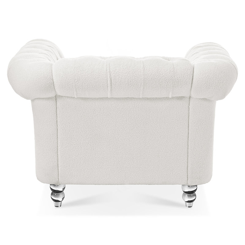 Chaise d'appoint élégante et confortable avec des boucles profondes et des pieds en bouleau durables, parfait pour les intérieurs modernes
