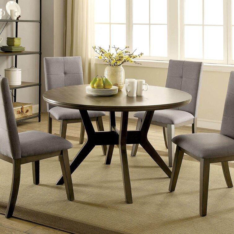 https://assets.wfcdn.com/im/05061172/resize-h755-w755%5Ecompr-r85/1100/110098211/Reynolds+Round+Dining+Table.jpg