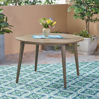 Table de salle à manger d'extérieur ronde avec pieds Mid-Century modernes