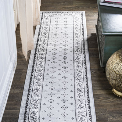 Tapis gris clair / crème Justice