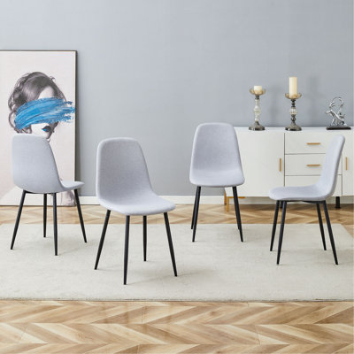 Ensemble de chaise de salle à manger confortable en lin et coton. Siège et dossier intégrés, matériau en lin et coton, assorti à la maison moderne.