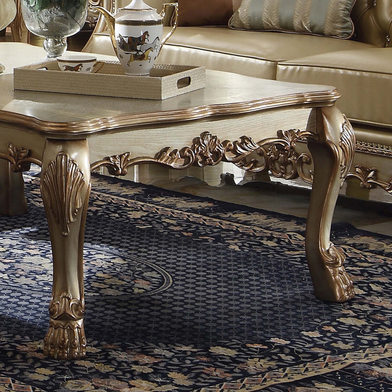 Table de bout avec pattes dorées