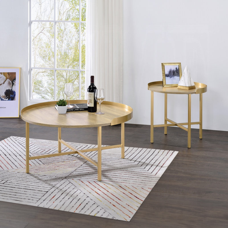 Table basse à plateau rond en chêne et or