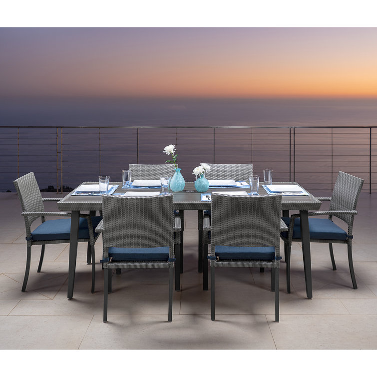 Ehrenfried Rectangular 6 - Person 78'' Long Wicker Dining Set with Sunbrella Cushions