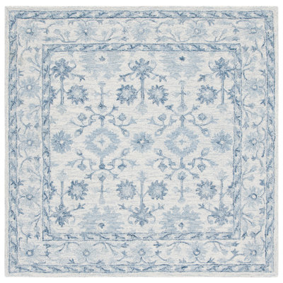 Lethe Oriental Handmade Tufted Wool Blue/Ivory Area Rug