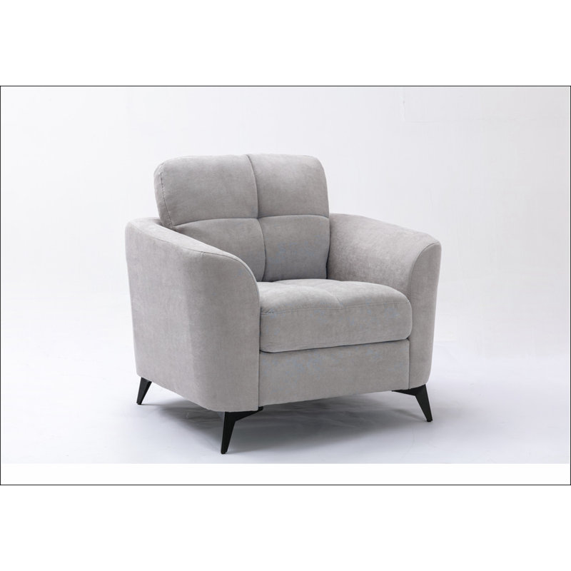 Fauteuil capitonné en tissu gris clair