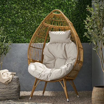 Élégante chaise en forme de larme avec housse de coussin - Structure de panier en fer beige intrigante