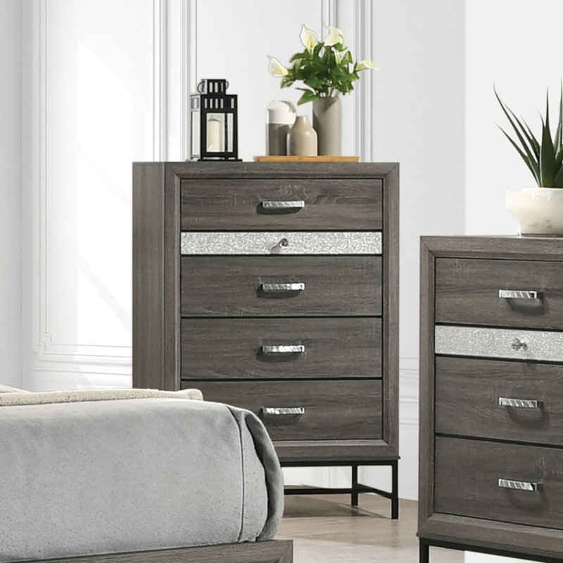 Commode de style contemporain à 4 tiroirs avec pieds en métal et poignées décoratives en acrylique
