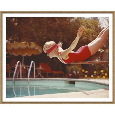 Young Woman in Blindfold Balancing on Diving Board Framed