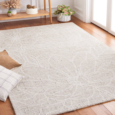 Adysun Hand Tufted Wool/Cotton Floral Rug in Beige/Ivory