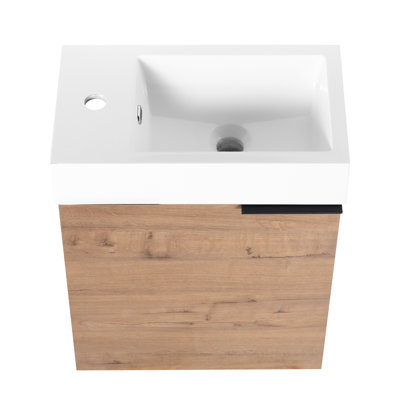 Meuble-lavabo de 18 po avec lavabo en résine et porte à fermeture en douceur - Fascination contemporaine Vaste option de rangement en contreplaqué