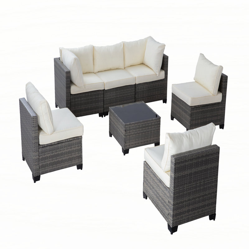 All-Weather 7-Piece Grey PE Wicker Patio Conversation Set with Beige Cushions and coffee table