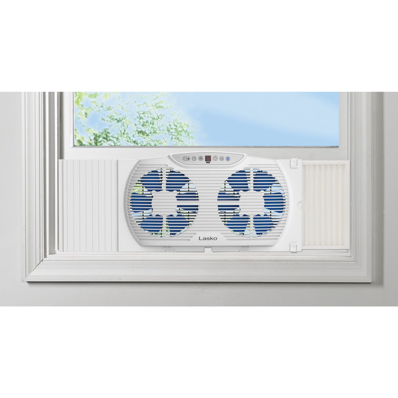 Ventilateur de fenêtre oscillant électriquement réversible