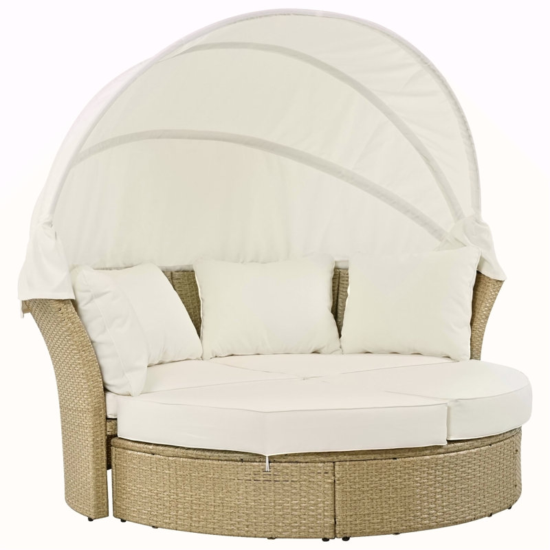 Lit de jour convertible pour terrasse avec auvent rétractable et coussins confortables, parfait pour se détendre au bord du jardin ou au bord de la piscine