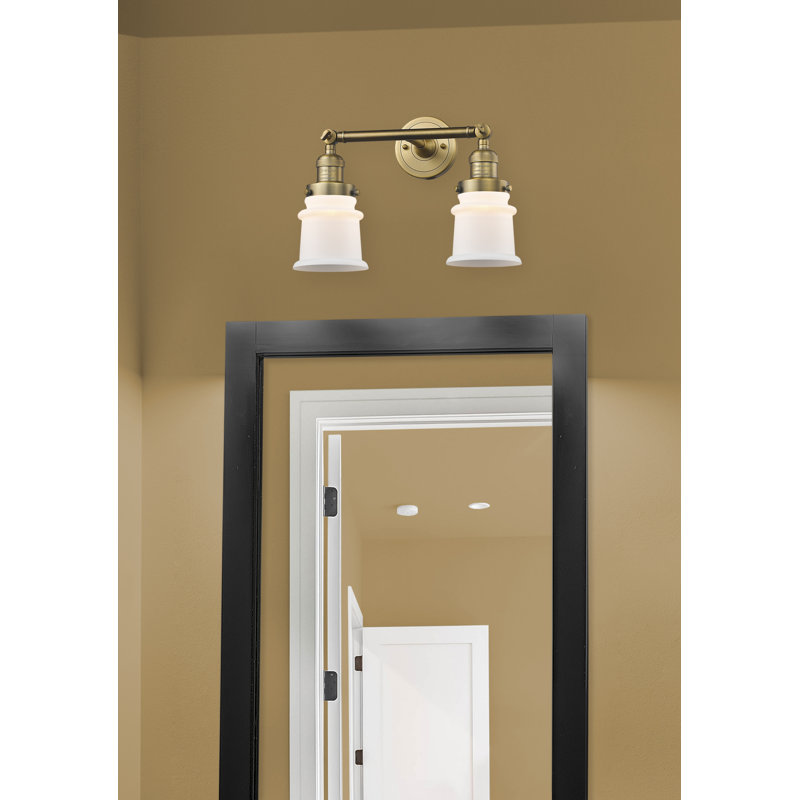 Éclairage pour salle de bain 2 lumières Alexandira, Boîtier blanc mat, Laiton brossé, Ampoule DEL 6 watts Vinage
