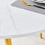 Ensemble de salle à manger rond extensible pour 6 personnes avec chaises gris neutre et table en bois aggloméré blanc, pieds en métal doré