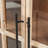 Alayna Brown Wood 1 Shelf and 2 Door Room Cabinet with Glass Front Panels