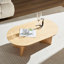 Table basse ovale moderne, plateau en panneau de fibres à densité moyenne et base à piédestal robuste-130122374