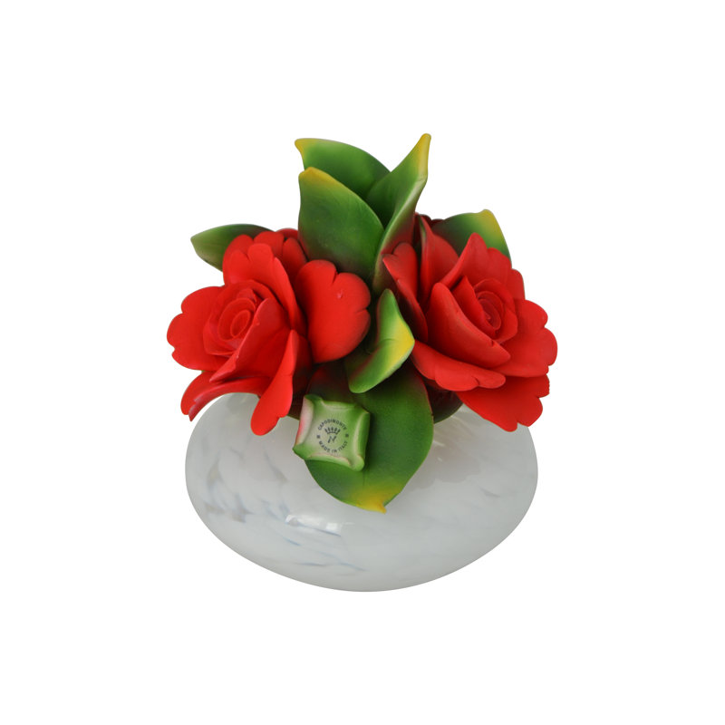 L'ensemble de diffuseur d'huile en céramique avec roses comprend une bouteille d'huile parfumée pour la maison de 4 oz