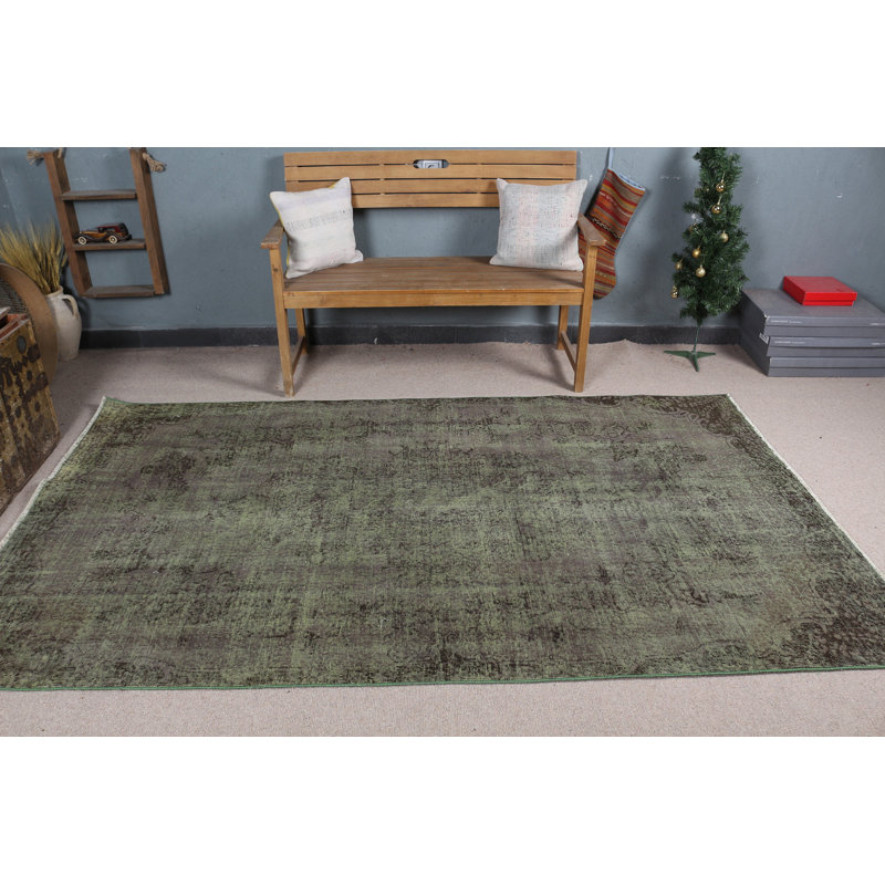 Chic tapis turc rétro vert pour rehausser l'esthétique de votre salon