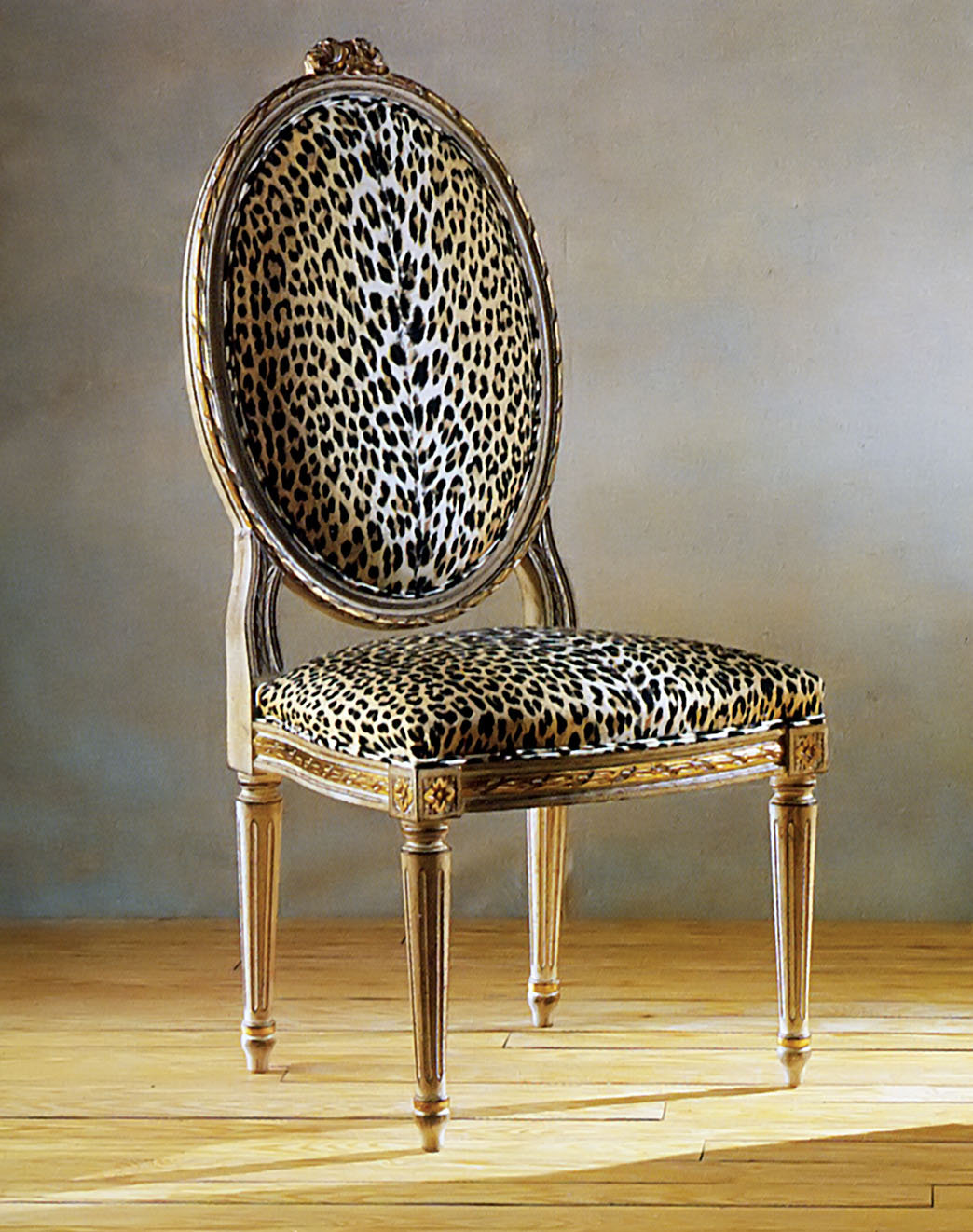 Black and Gold Safari Animal Upholstered Chair and Ottoman