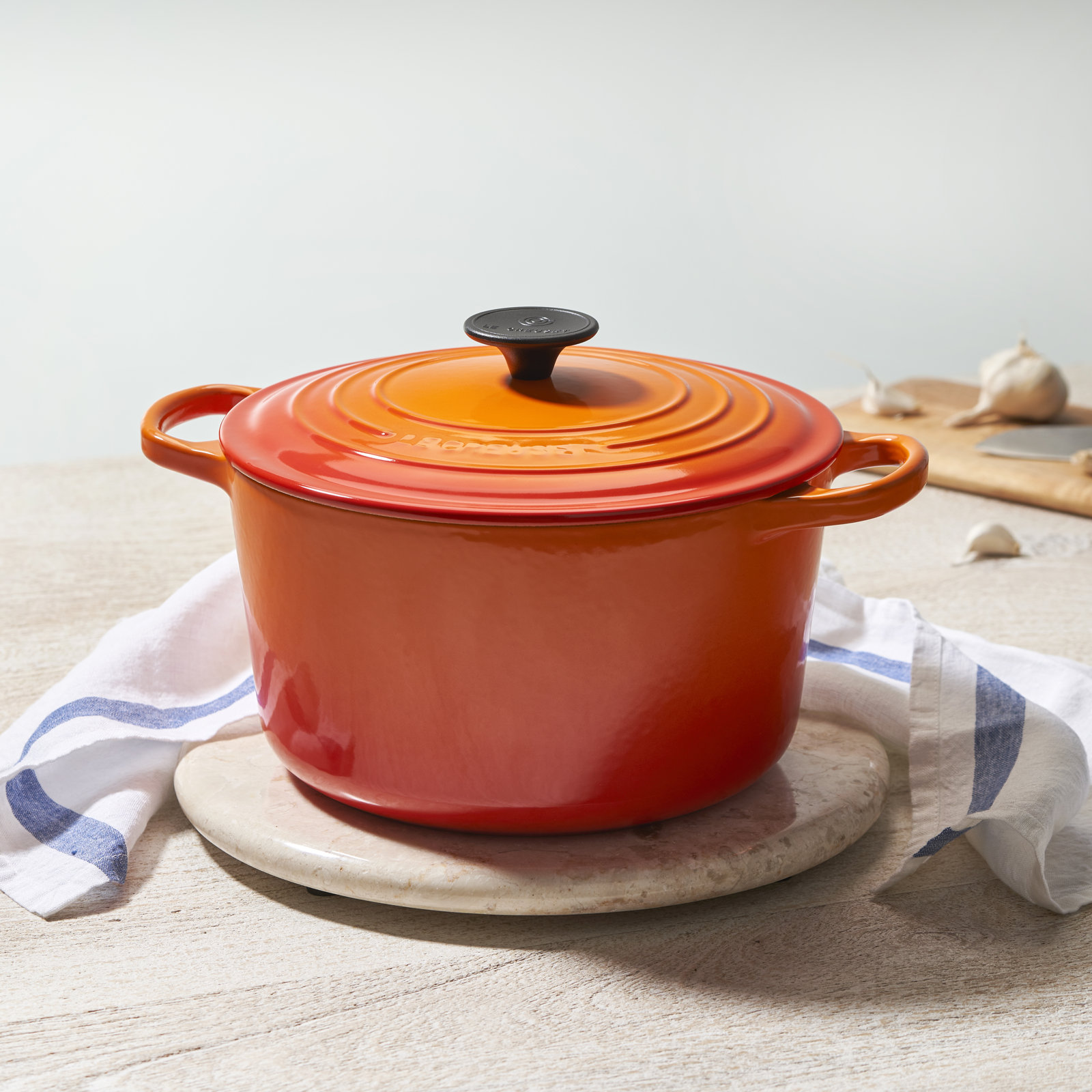 Le Creuset Signature Enameled Cast Iron Round Dutch Oven with Lid, 6.75 quarts, Flame/Black