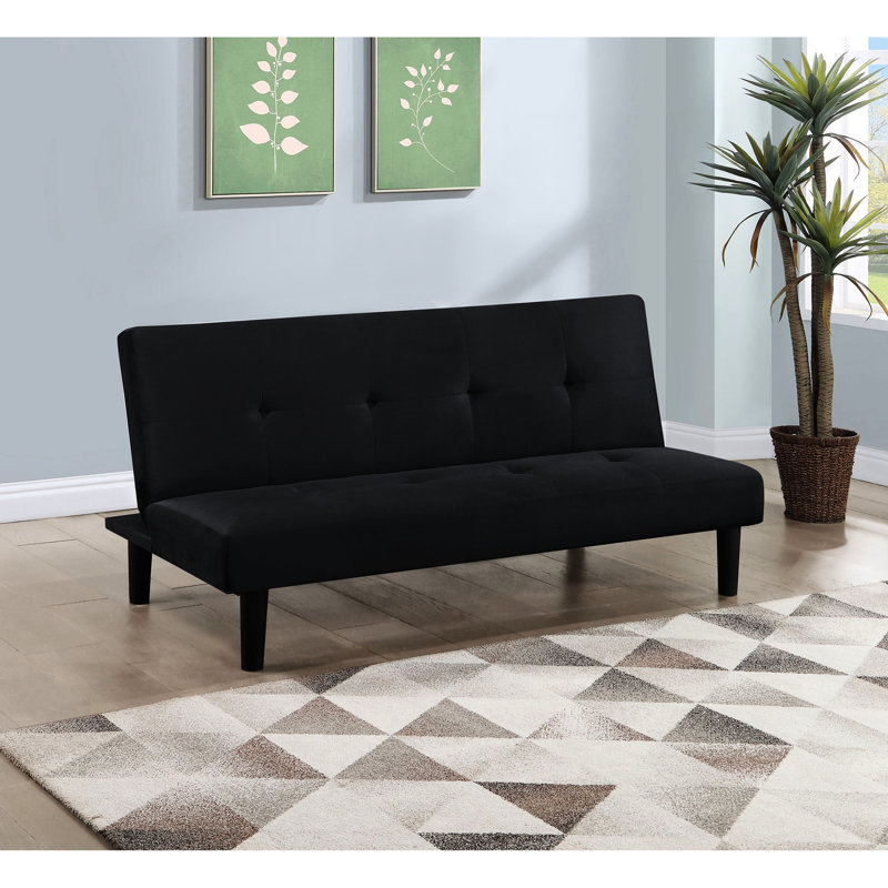 Lit convertible noir sans accoudoirs avec un revêtement lisse, un support fiable et un siège à ressorts sinueux à l'esthétique contemporaine, coussins, confort pour les invités qui passent la nuit
