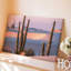 Toile, "Un paysage serein du désert à l'aube" avec de grands cactus élancés avec des textures nervurées complexes-1467592123