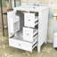 Meuble-lavabo 24 po avec comptoir en céramique, 3 tiroirs et porte-outils de rangement-131148209