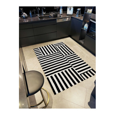 Tapis noir lavable à motif géométrique à motif géométrique noir