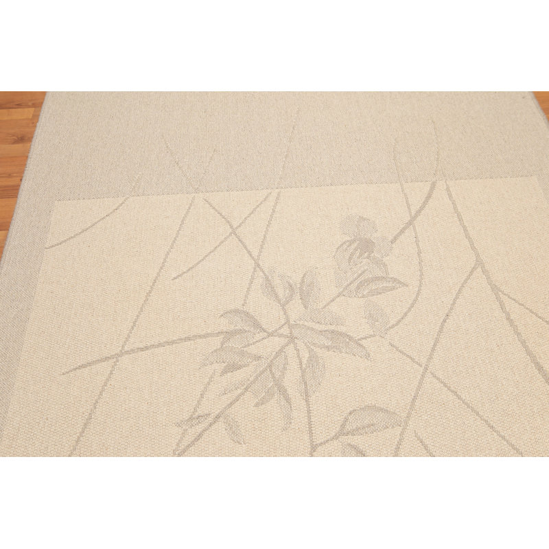 Tapis à aire beige en laine Davies