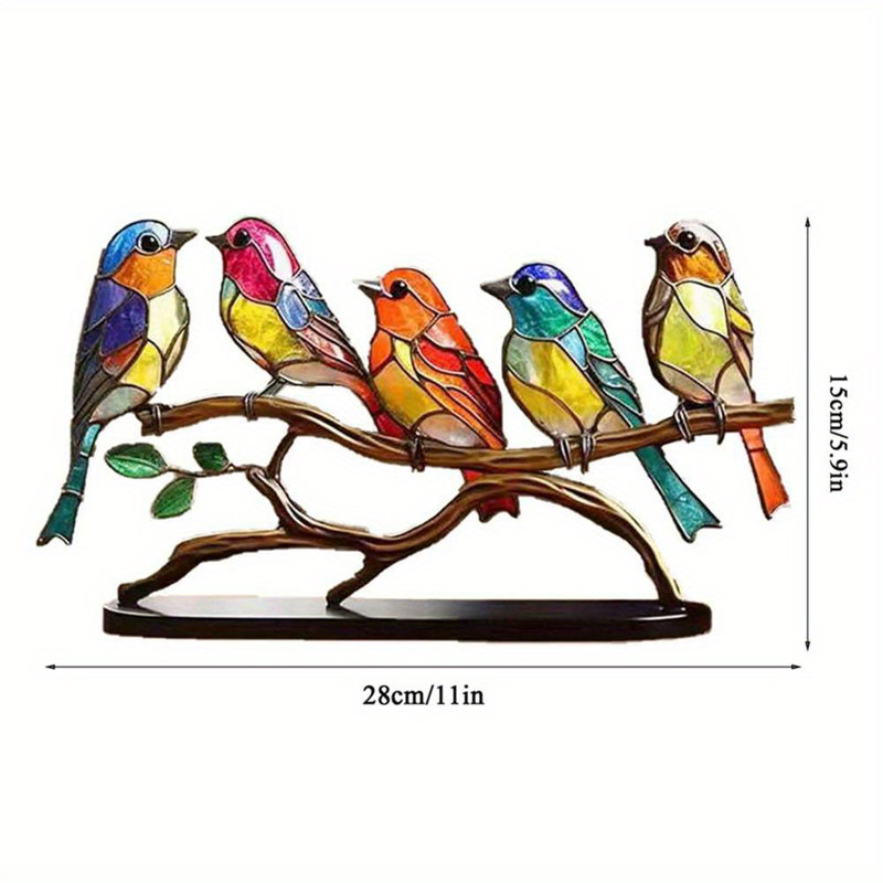 Figurine d'oiseau en acrylique sur une branche