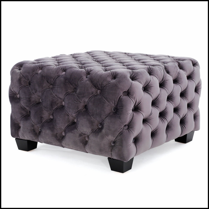 Luxueux repose-pieds moderne aux textures douces et aux couleurs de bijoux, parfait pour rehausser le décor et le confort.