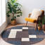 Tapis bleu touffeté à motif géométrique Allyne-1259850381
