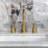 Kingston Brass Synchronous Two-Handle 3-Hole Deck Mount Widespread Bathroom Faucet with Brass Pop-Up Drain-101073263