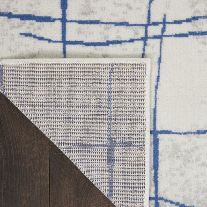 Tapis abstrait ivoire en polypropylène tissé à la machine, Rectangle 2 pi x 3 pi