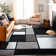 Astika Geometric Gray/White/Black Area Rug
