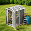 Remise grise spacieuse avec rangement, conception moderne pour le jardin