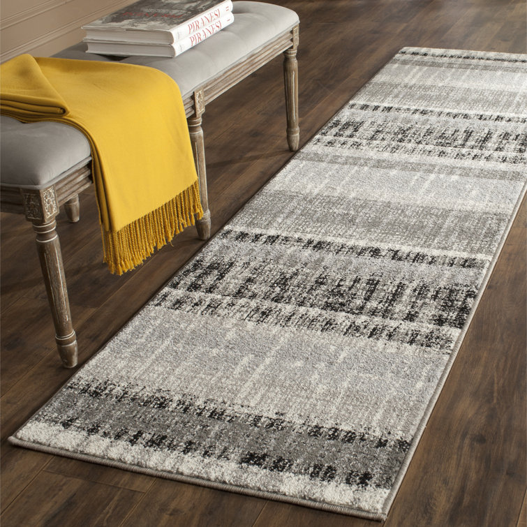 Tapis rayé crème / gris foncé