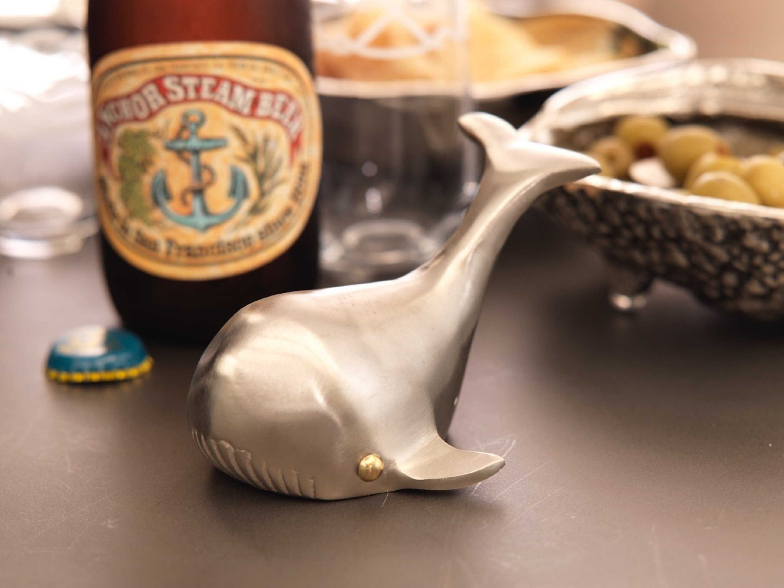 https://assets.wfcdn.com/im/05208160/compr-r85/5199/51999069/amedeo-orca-whale-pewter-bottle-opener.jpg