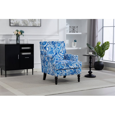 Fauteuil d'appoint rembourré avec garniture cloutée pour le salon