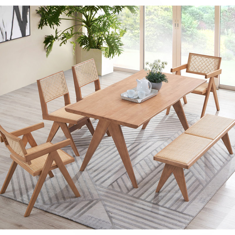 Table de salle à manger charmante en rotin et finition naturelle pour des rassemblements confortables