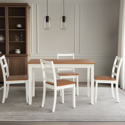 L'ensemble de table de salle à manger 5 pièces comprend une table rectangulaire et 4 chaises