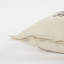 Coussin décoratif gris crème