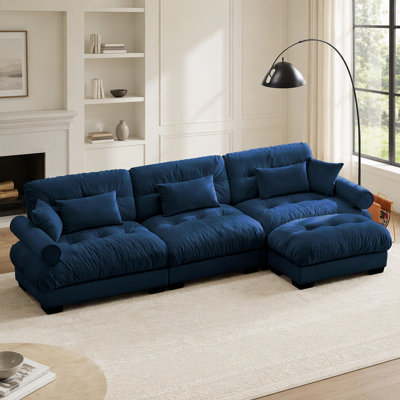 Canapé d'angle modulaire surdimensionné en velours ultra confortable avec pouf amovible, assise profonde et design convertible en L pour une détente optimale.