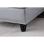 Canapé d'angle en L 3 pièces en similicuir gris, idéal pour des séances de cinéma et des jeux vidéo relaxantes. Siège central rabattable avec porte-gobelets, deux coussins décoratifs et rangement. Structure en bois massif et composite, profil bas.