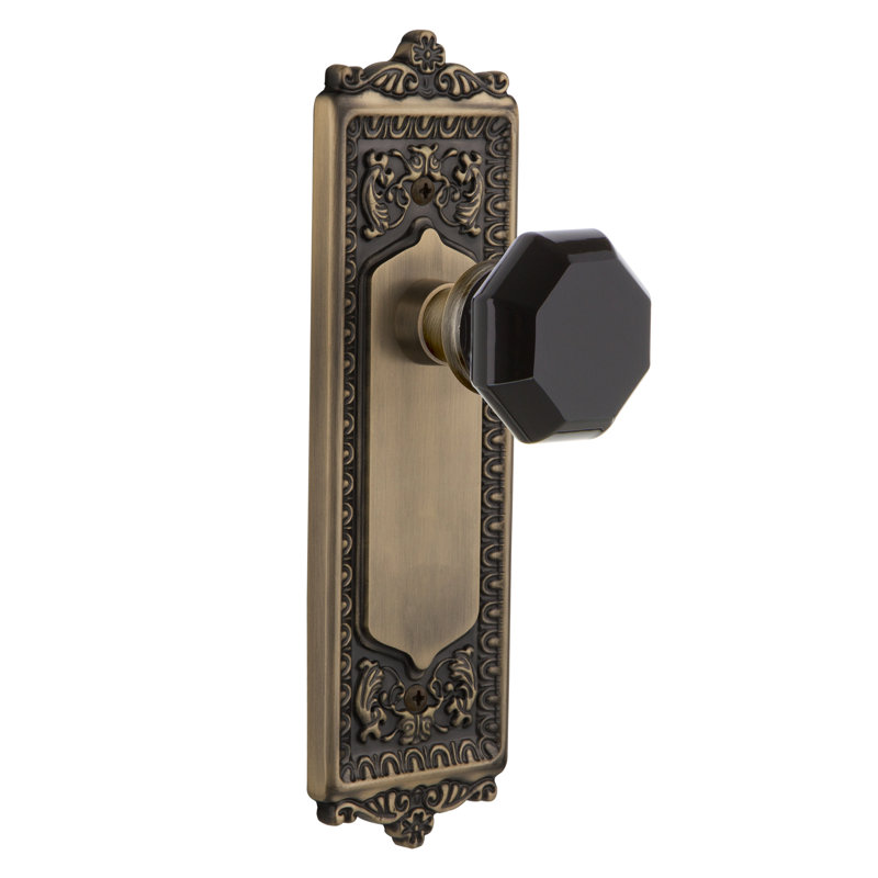 Egg & Dart Plate with Waldorf Black Door Knob, Antique Brass, 2-3/8”