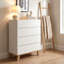 Commode de rangement moderne sans poignée à 4 tiroirs avec pieds en bois naturel massif, finition blanche